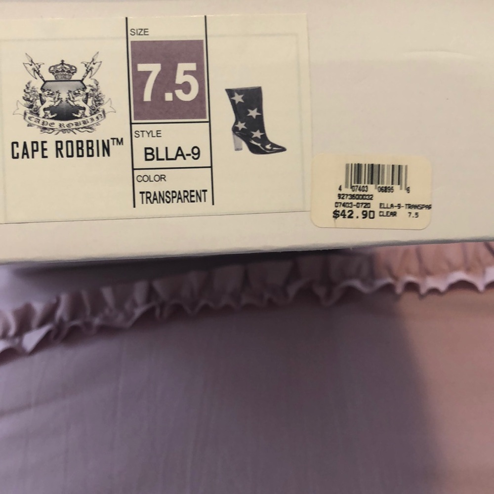 Clear boots with purple stars. Never worn.